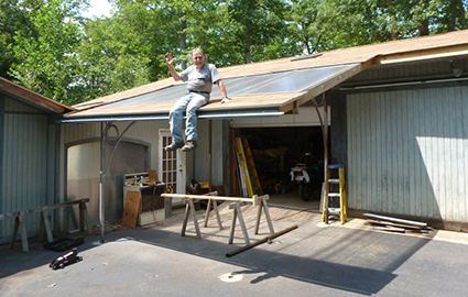 Designed, engineered and fabricated carport with removable corner post Designed, engineered and fabricated carport with removable corner post